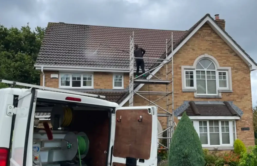 cleaning moss from a roof